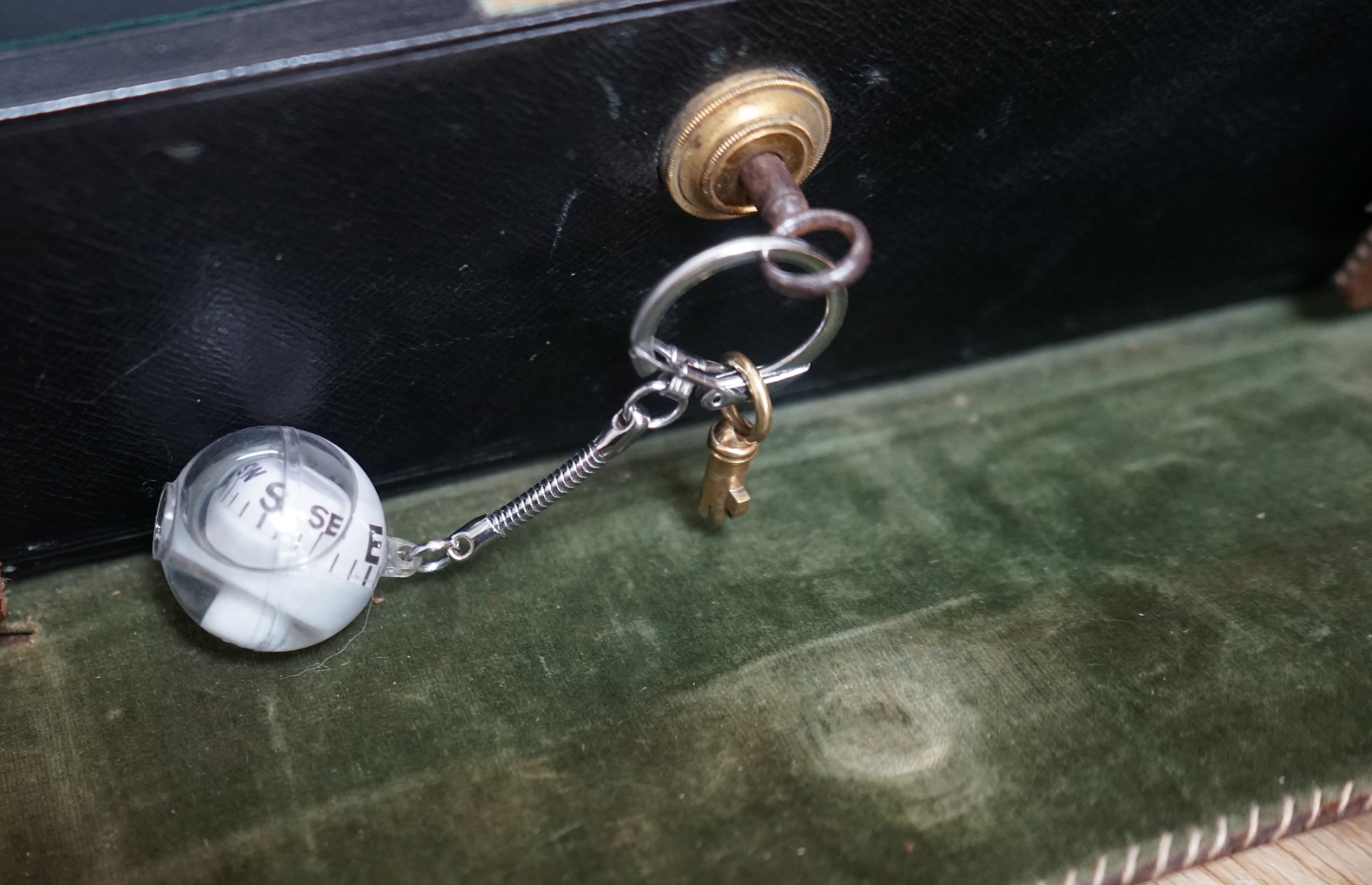 Wells & Lambert, London, a travelling writing box and outer leather case, with Bramah lock and keys, with monograms and inscriptions of Rev. George A. Robins, the box incorporating a silver lidded inkwell, 33cm wide. Con